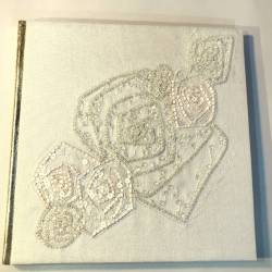 Album cuir et broderie